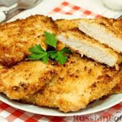 Отбивная из свинины панированная в сухарях