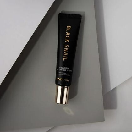 Сыворотка-роллер с муцином улитки для кожи вокруг глаз FARMSTAY Black Snail Premium Rolling Eye Serum 25 мл