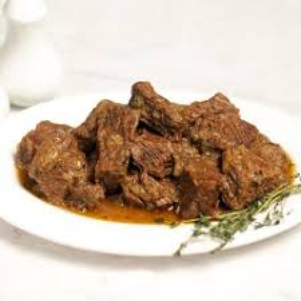 Мясо тушеное с соусом