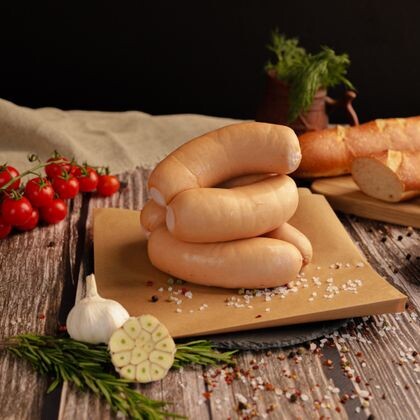 Изделие колбасное вареное мясное "Сардельки Фирменные" высшего сорта